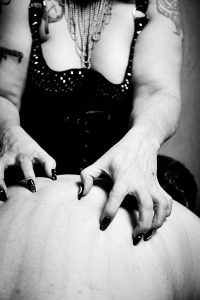 Nails scratching my slave's back to remind him, he belongs to me. 