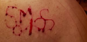 Cutting for marking Mistress's slave with mistress's initials